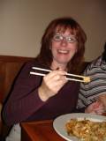 Brenda got those chopsticks down pat!